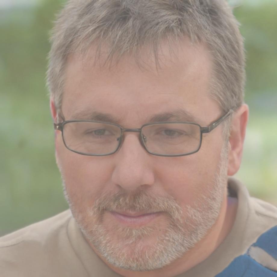 Senior testing engineer reviewing automated test results